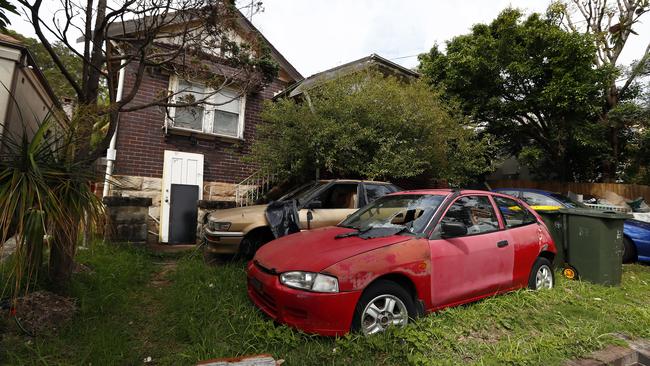 Numerous cars clutter the yard of a Malabar Rd property in Maroubra. Picture: Sam Ruttyn