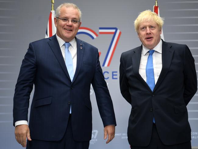 BIARRITZ, FRANCE - AUGUST 24: British Prime Minister Boris Johnson (R) meets Australian Prime Minister Scott Morrison (L) for their bilateral talks during the G7 Summit on August 24, 2019 in Biarritz, France. The French southwestern seaside resort of Biarritz is hosting the 45th G7 summit from August 24 to 26. High on the agenda will be the climate emergency, the US-China trade war, Britain's departure from the EU, and emergency talks on the Amazon wildfire crisis. (Photo by Neil Hall- Pool/Getty Images)