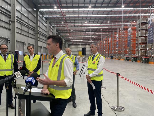 NSW Premier Chris Minns and Roads Minister John Graham at an announcement at the Mamre Road precinct at Western Sydney Aerotropolis. Photo: Lachlan Leeming