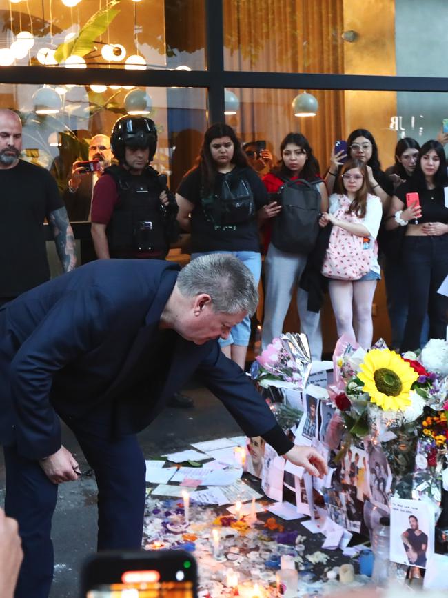 Geoff pays his respects as fans watch on. Picture: Getty