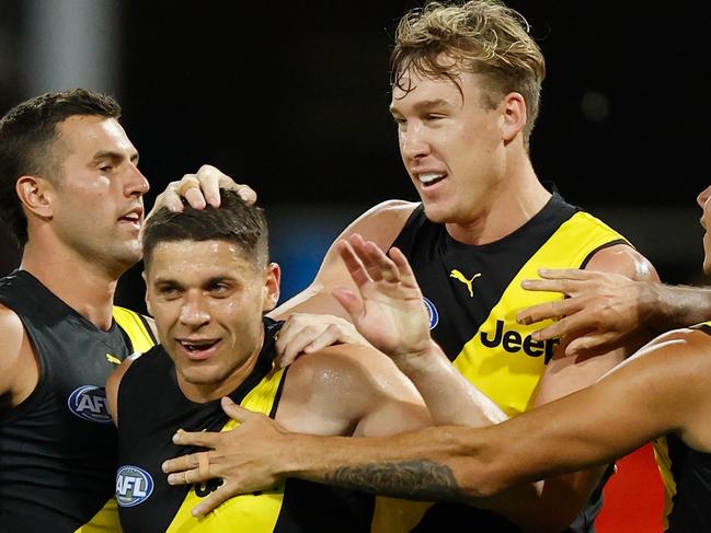 GOLD COAST, AUSTRALIA - OCTOBER 09: (L-R) Jack Graham, Dion Prestia, Tom J. Lynch and Daniel Rioli of the Tigers celebrate during the 2020 AFL Second Semi Final match between the Richmond Tigers and the St Kilda Saints at Metricon Stadium on October 09, 2020 in the Gold Coast, Australia. (Photo by Michael Willson/AFL Photos via Getty Images)