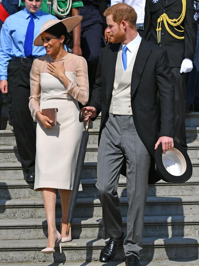 The newlyweds make their first public appearance since their wedding. Picture: Dominic Lipinski — Pool/Getty Images