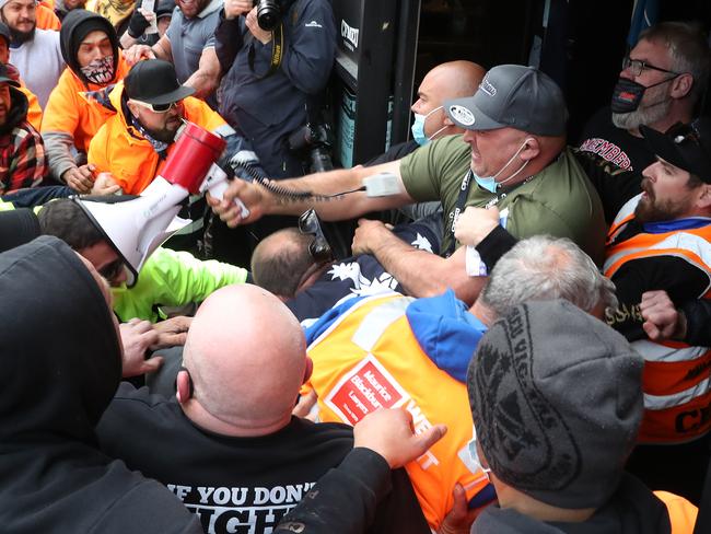 Construction workers brawl during a protest at the CFMEU building. Picture: David Crosling