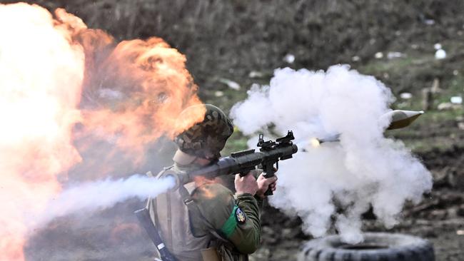 A Ukrainian serviceman fires a rocket-propelled grenade during training in the Donetsk on Friday. Picture: AFP