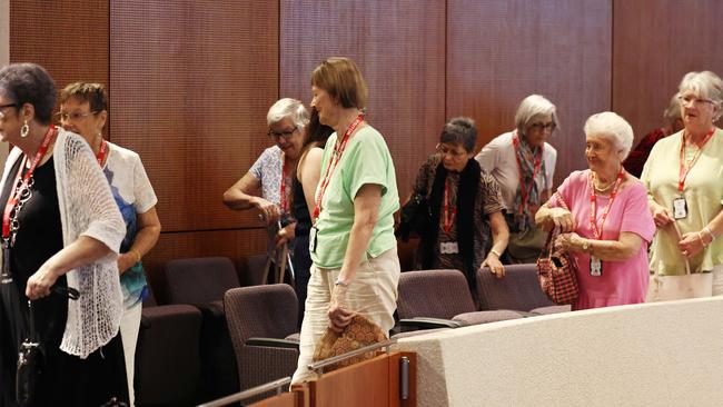 Residents of Cairns retirement villages leave the public gallery at the Cairns Regional Council ordinary meeting after a deputation delivered by Kevin McRae and Colleen Duplock regarding the proposed changes to council rates. Picture: Brendan Radke