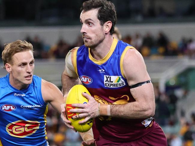 BRISBANE, AUSTRALIA - JULY 23: Darcy Gardiner of the Lions in action during the 2022 AFL Round 19 match between the Brisbane Lions and the Gold Coast Suns at The Gabba on July 23, 2022 in Brisbane, Australia. (Photo by Russell Freeman/AFL Photos via Getty Images)