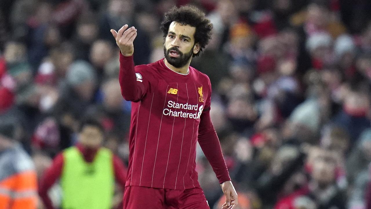 Liverpool's Mohamed Salah reacts after scoring his team's second goa.