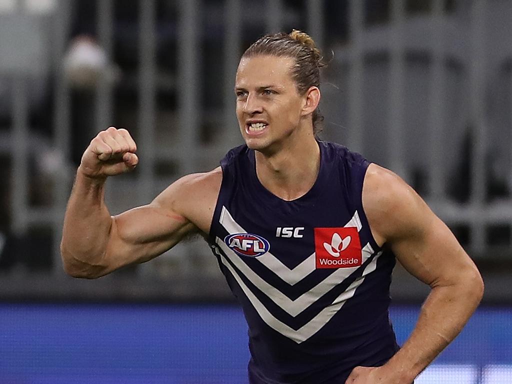 PERTH, AUSTRALIA - AUGUST 02: Nat Fyfe of the Dockers celebrates a goal during the round nine AFL match between the Fremantle Dockers and the Collingwood Magpies at Optus Stadium on August 02, 2020 in Perth, Australia. (Photo by Paul Kane/Getty Images)