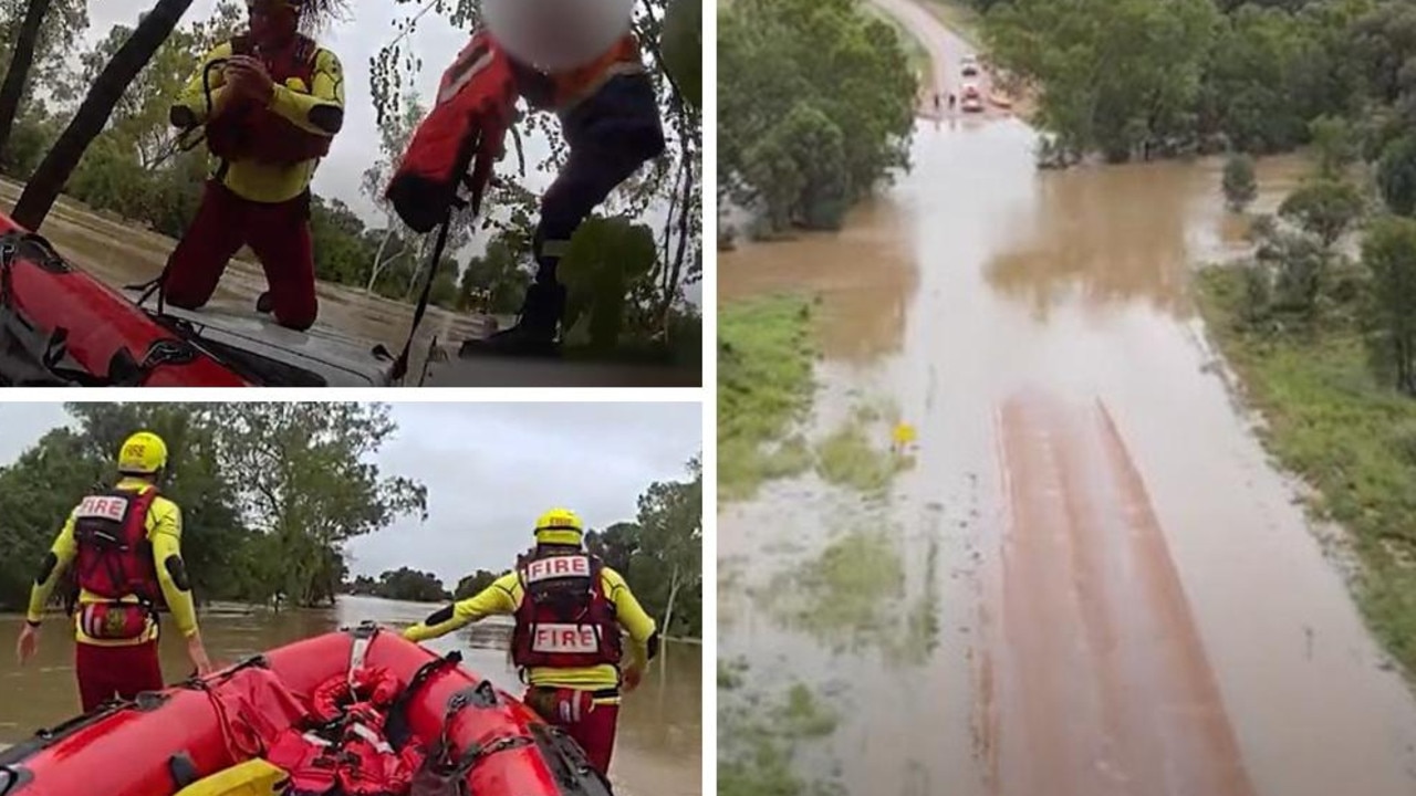 Driver rescued after hours trapped on flood-swept ute’s roof