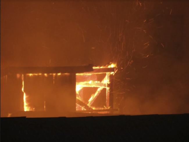 The fire spread near the Nylex Grain Silo site overnight. Picture: Kiah Doodie