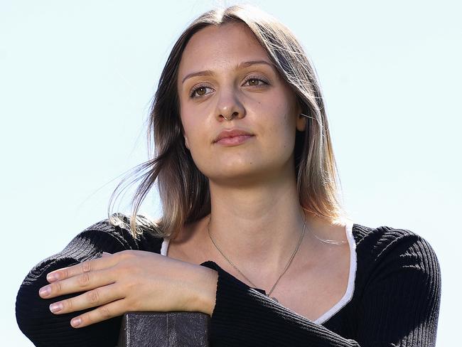 Leonie Van Gool is a Gold Coast nursing student who "got botched“ in a cosmetic procedure couldn't be any more scathing about the impact of social media:  It strips you of your identity Leonie Van Gool, 24, also says social media normalises having something to hate about yourself. Last year Ms Van Gool went to a reputable clinic to get dermal fillers in her tear troughs to eliminate bags under her eyes. The person injected her with the wrong solution and her eye sockets went black like she'd been punched. She has since had the fillers removed. Pics Adam Head