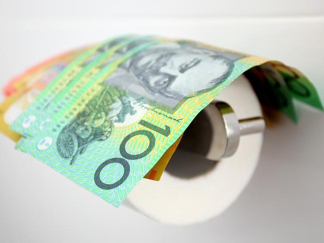 Flushing money down the toilet. Australian money in toilet, generic