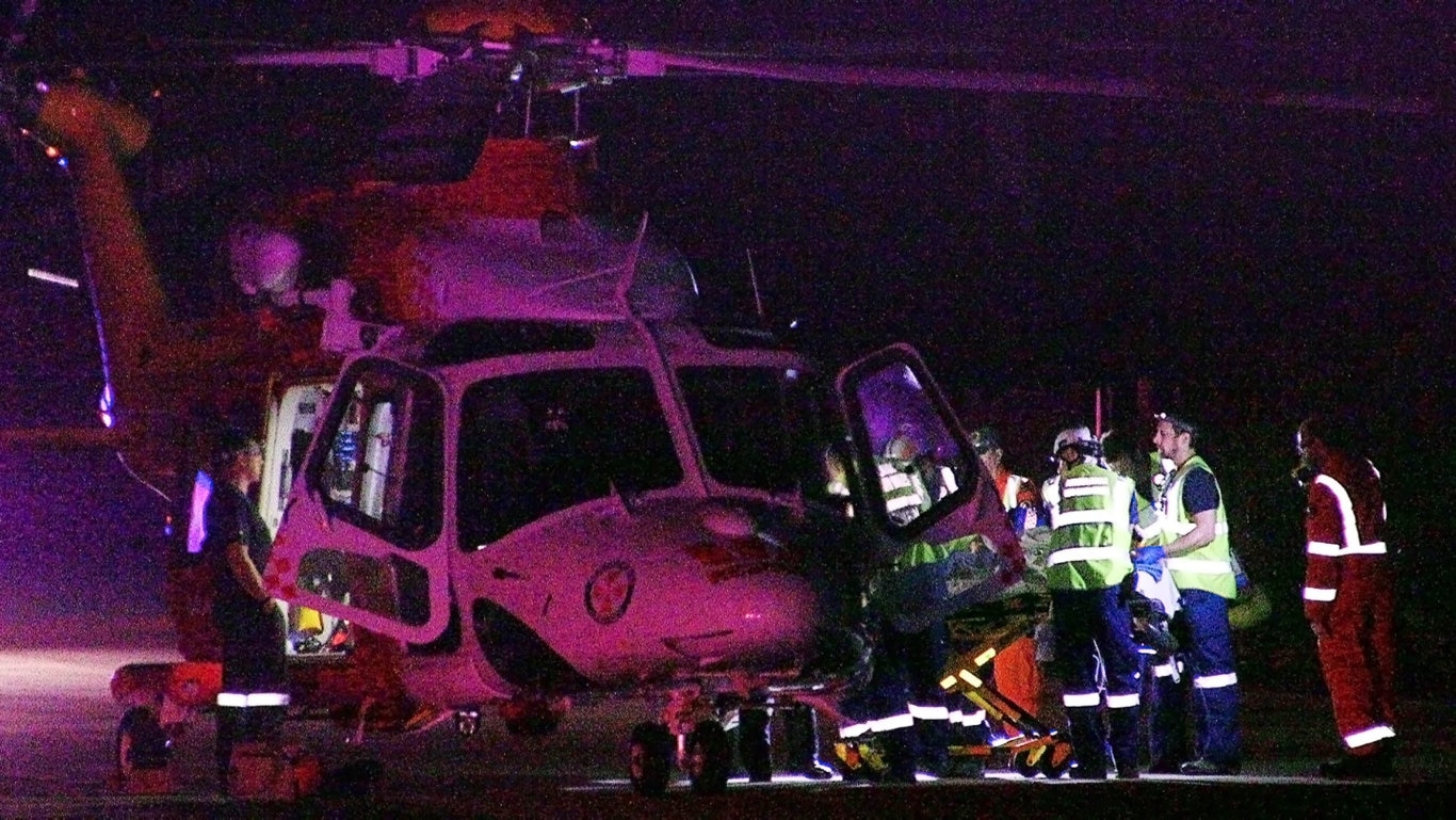 Two men were killed and one woman injured in a single-vehicle roll-over on the Pacific Highway near Glenugie on Sunday night. Picture: Frank Redward