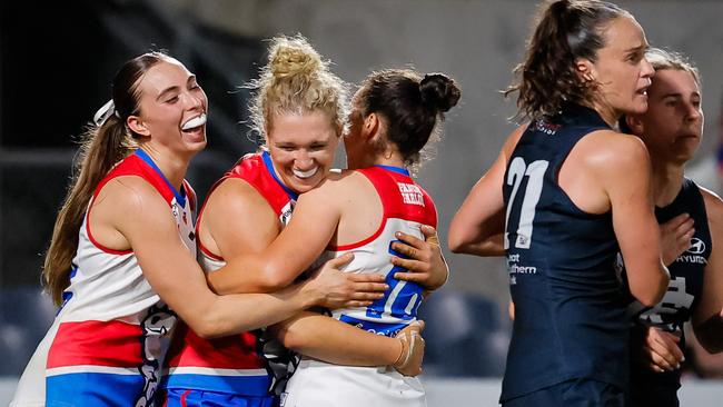 MELBOURNE, AUSTRALIA - OCTOBER 17: Analea McKee of the Bulldogs celebrates a goal during the 2024 AFLW Round 08 match between the Carlton Blues and the Western Bulldogs at Ikon Park on October 17, 2024 in Melbourne, Australia. (Photo by Dylan Burns/AFL Photos via Getty Images)