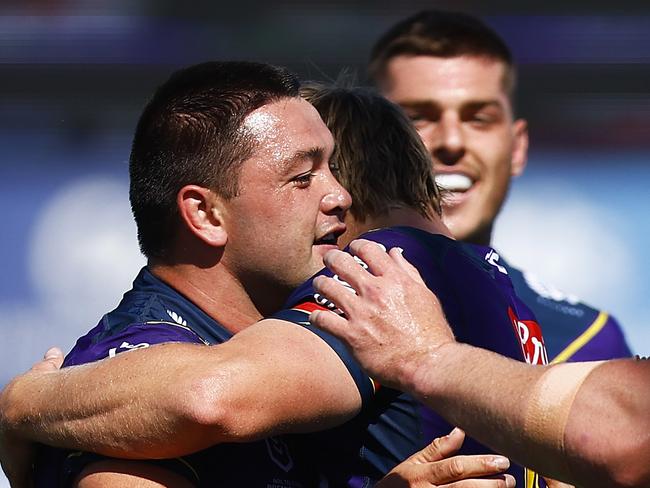 MELBOURNE, AUSTRALIA - FEBRUARY 19: Brandon Smith of the Storm (L) celebrates a try during the NRL Trial match between the Melbourne Storm and the New Zealand Warriors at Casey Fields on February 19, 2022 in Melbourne, Australia. (Photo by Daniel Pockett/Getty Images)