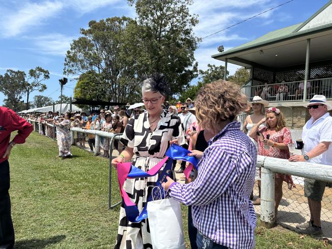 Racegoers at the Torbanlea Picnic Races.