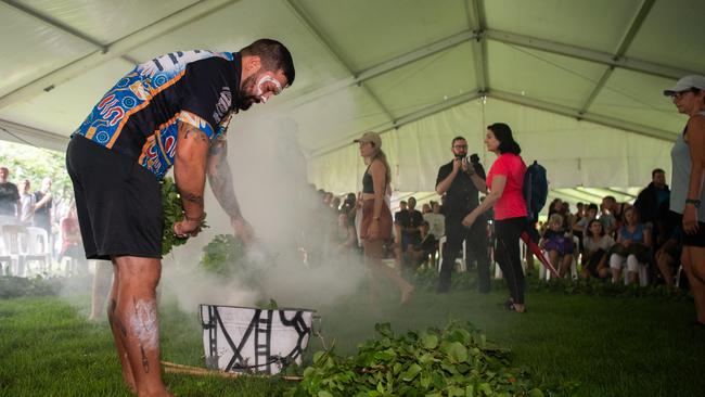 Trent lee with the fire for the smoking ceremony at the annual Australia Day Oz Run at the Darwin Waterfront. Picture: Pema Tamang Pakhrin