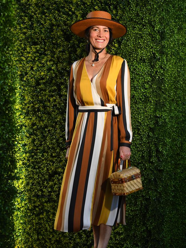 A Fashions on the Field contestants giddies up for the races. Picture: AAP Image/James Ross