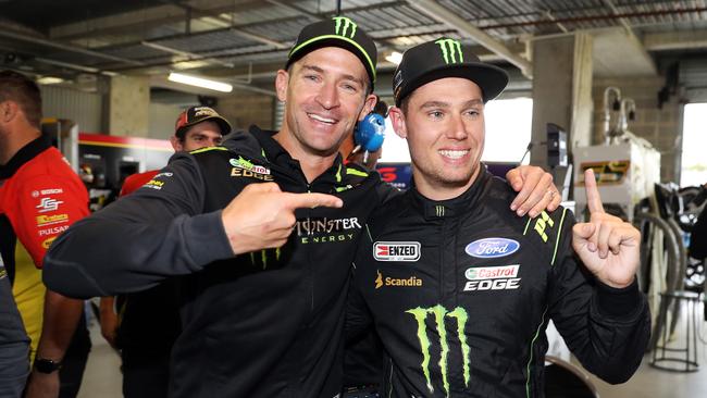 Cam Waters with his co-driver Will Davison after claiming pole position at Mount Panorama. Picture: Tim Hunter