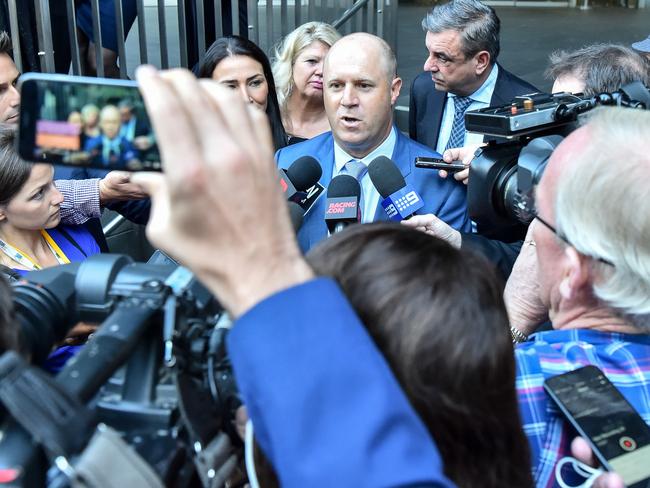 Trainers Danny O'Brien (centre) and Mark Kavanagh (rear) after their successful appeal against suspensions for using cobalt. Picture: Getty Images