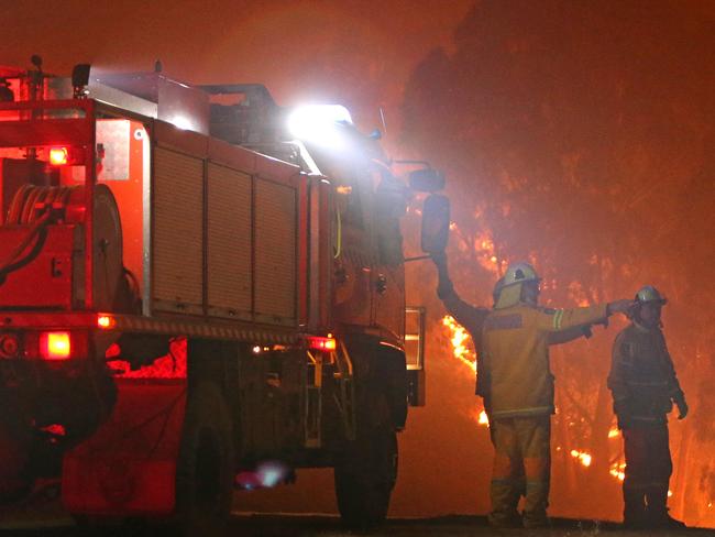 04/01/2020: RFS firefighters work to contain a fire that threatens the township of Bemboka, Northwest of Bega while bushfires continue to ravage the Southern Coast of N.S.W. Stuart McEvoy/The Australian.