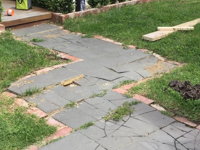 They said the builders used a cherry picker and destroyed the garden, causing $6000 worth of damage. Picture: Supplied