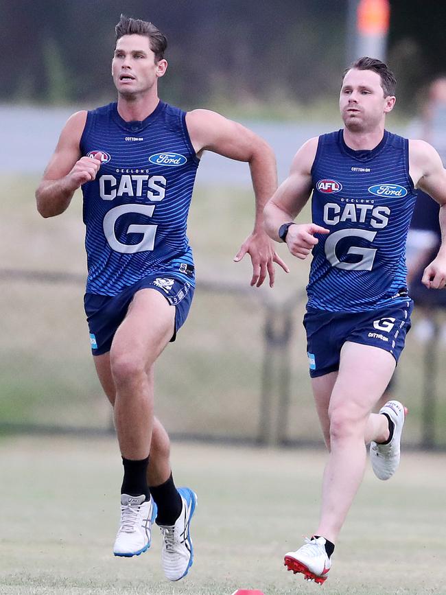 Tom Hawkins tests Patrick Dangerfield’s speed off the mark. Picture: Sarah Reed