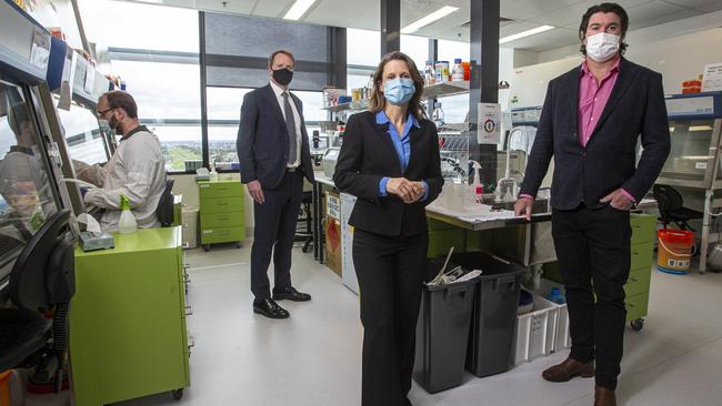 John Lambert, CEO of Amplia Therapeutics, with Lisa Dube, acting CEO of Cancer Therapeutics CRC, and Mark Devlin, chief science officer at Amplia. Picture: Aaron Francis