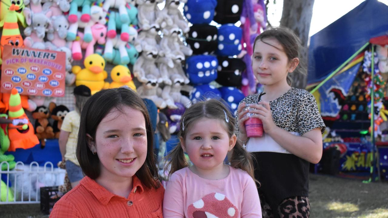 'Show Kids' Everley Baker, Violet Blaze, Lakea Davis enjoyed exploring Bowen Showgrounds on Tuesday. Picture: Kirra Grimes