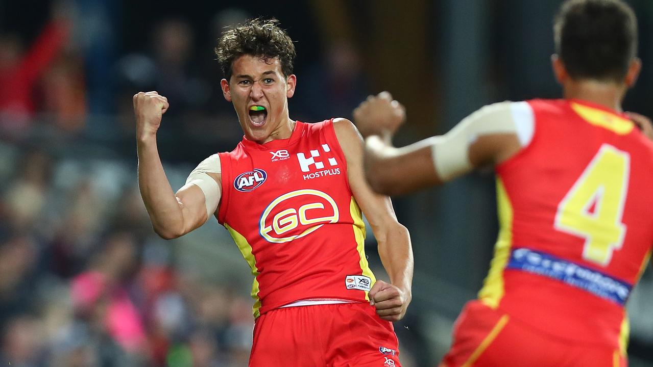 Wil Powell celebrates a goal for Gold Coast.