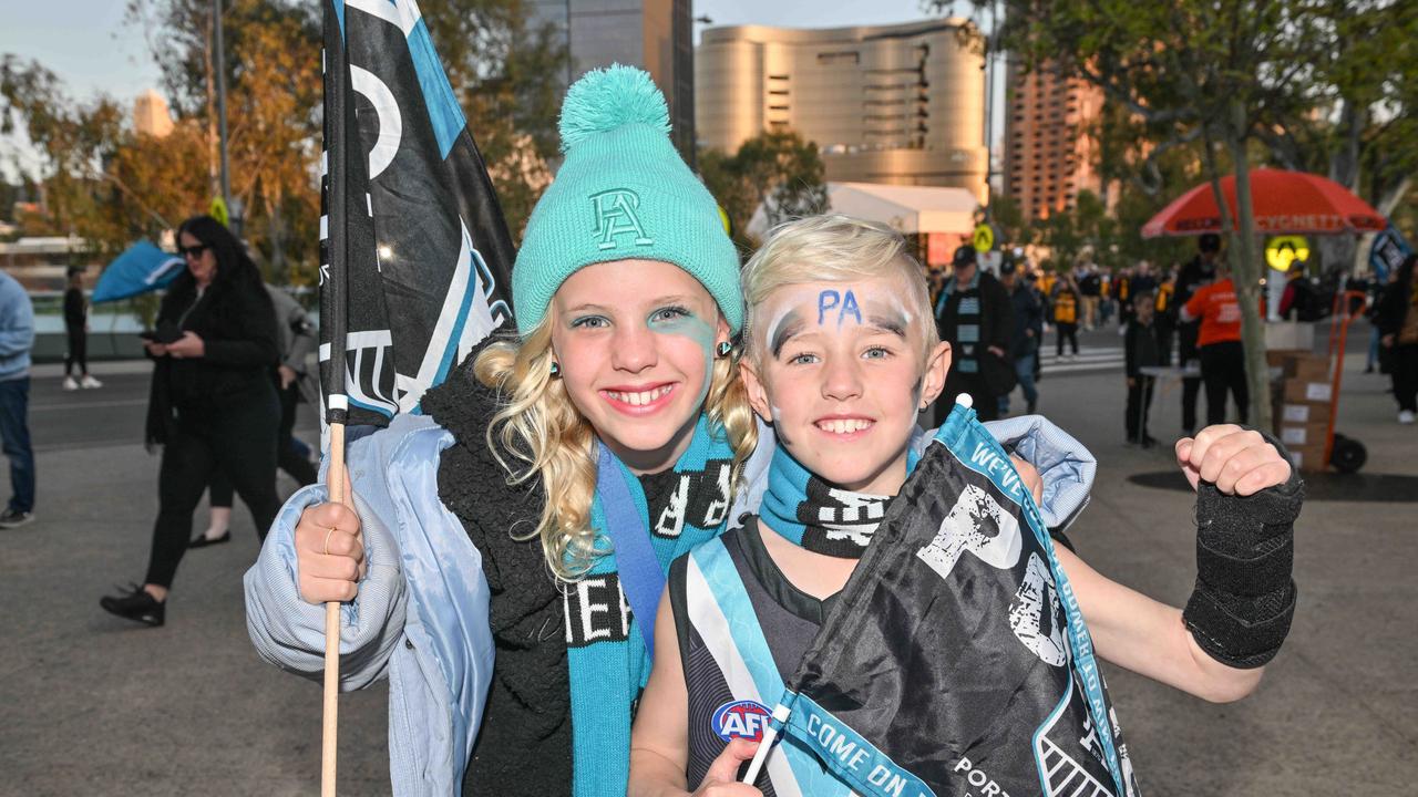 SEPTEMBER 13, 2024: Fans arriving for the Port v Hawthorn semi final at Adelaide Oval. Indie 11 and Beau 9 will be in the guard of honour as the players run out. Picture: Brenton Edwards