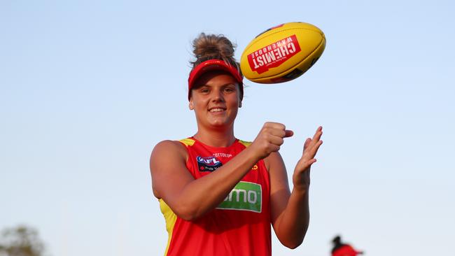 Jordann Hickey handballs during a Gold Coast Suns AFLW training session at Austworld Centre at Metricon Stadium on November 25, 2019 in Gold Coast, Australia. (Photo by Chris Hyde/Getty Images)