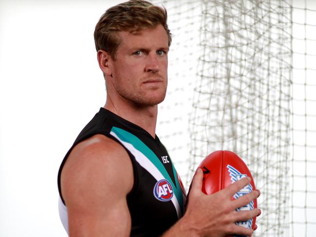 AFL Port Adelaide Player Tom Jonas poses for a portrait at the Port Adelaide Football Club in Adelaide, Wednesday, February 26, 2020. (AAP Image/Kelly Barnes) NO ARCHIVING