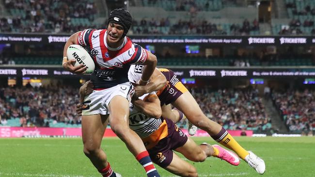 SYDNEY, AUSTRALIA – MAY 22: Joseph Suaalii of the Roosters is tackled during the round 11 NRL match between the Sydney Roosters and the Brisbane Broncos at Sydney Cricket Ground, on May 22, 2021, in Sydney, Australia. (Photo by Matt King/Getty Images)