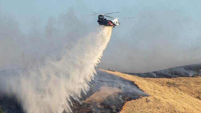 The chinook at work. Picture: Jason Edwards