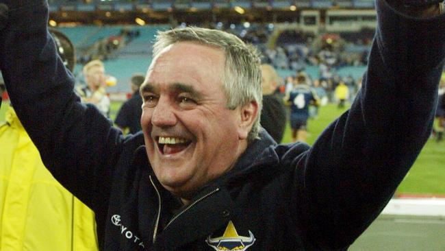 11 Sept 2004 NRL week 1 finals - Broncos vs Melbourne Storm @ Suncorp Stadium. Jubilant Cowboys coach Graham Murray celebrates picMark/Evans sport rugby league action fists profile