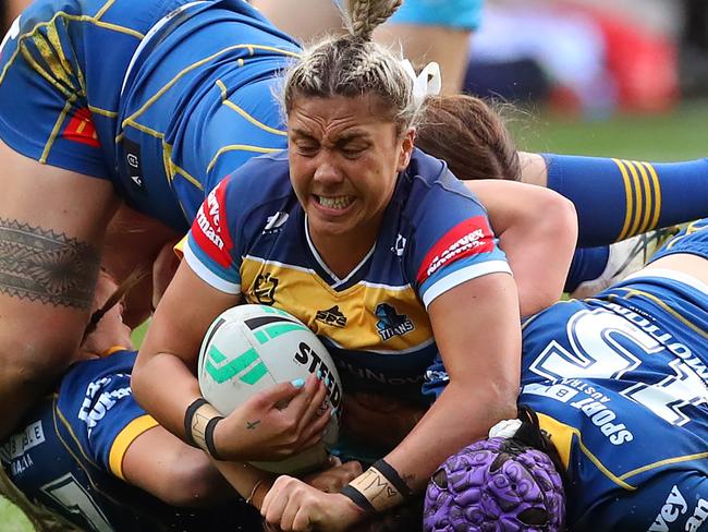 MELBOURNE, AUSTRALIA - SEPTEMBER 10: Shannon Mato of the Titans is tackled during the round four NRLW match between Gold Coast Titans and Parramatta Eels at AAMI Park, on September 10, 2022, in Melbourne, Australia. (Photo by Kelly Defina/Getty Images)