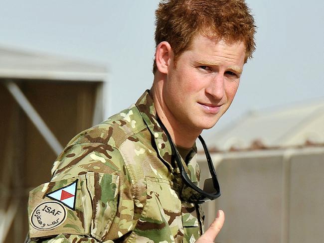 Britain's Prince Harry gives the thumbs up upon his arrival at Camp Bastion in Afghanistan, on September 7, 2012. Picture: AFP PHOTO/JOHN STILLWELL