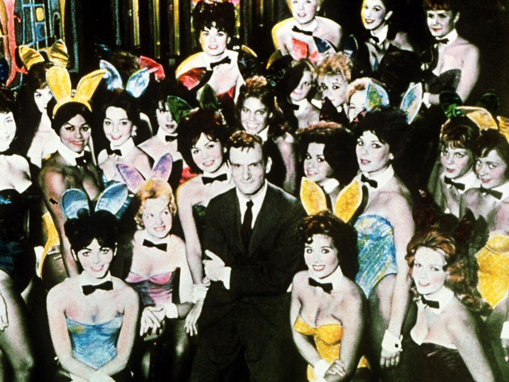 <p>Playboy magazine founder and president Hugh Hefner with some of his bunnies at the Playboy Club, from the TV show 'America in The Fifties'.</p>