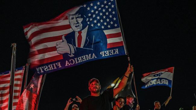 Supporters of former US President Donald Trump stand outside his residence in Mar-A-Lago after it was raided by the FBI. Picture: AFP