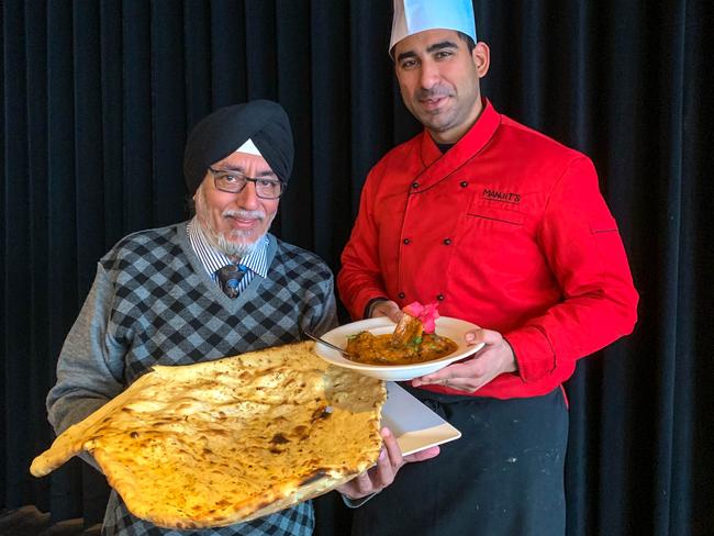 Manjit Gujral and his son Varun at their famous Indian restaurant. Picture: Jenifer Jagielski