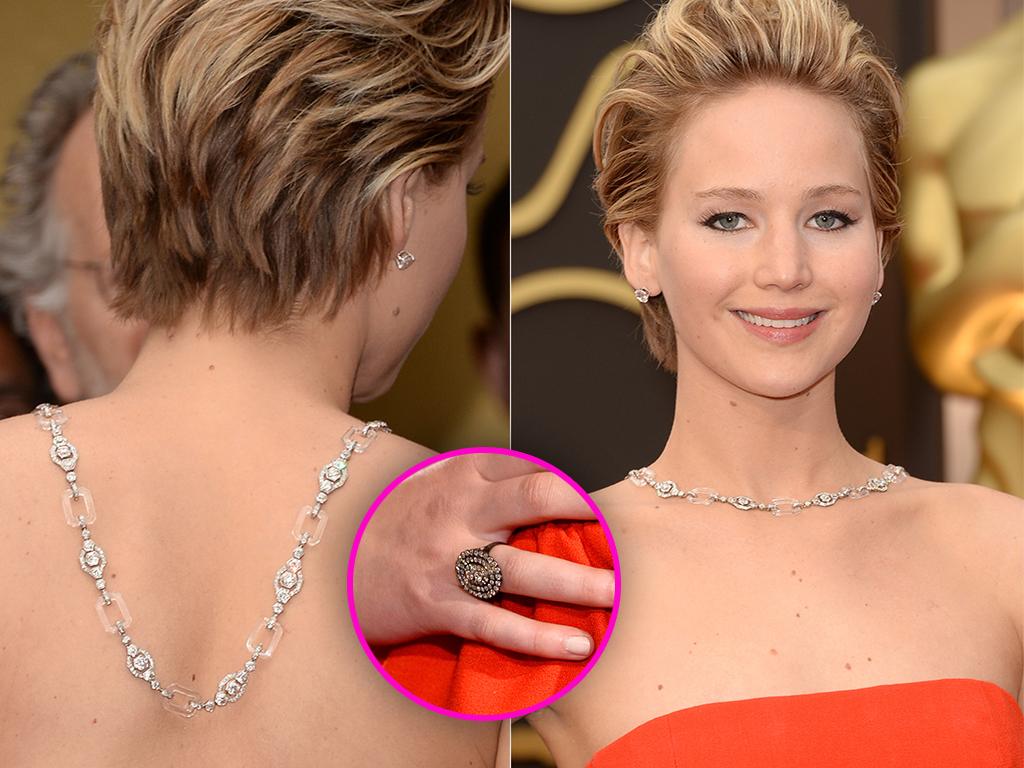 Jennifer Lawrence arrives at the 2014 Oscars dripping in around $3.5 million worth of jewellery designed by Neil Lane: 100-carat necklace – $2 million, 10-carat diamond stud earrings – around $500,000 and finishing that off with a diamond and platinum ring – $1 million. Pictures: Getty