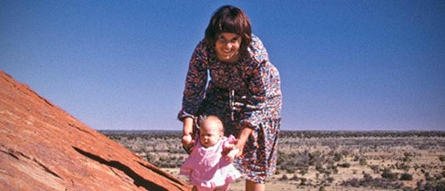 Lost love … Lindy Chamberlain with infant daughter Azaria climbing Uluru a day before she disappeared. Picture: Supplied