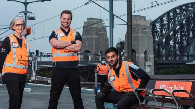 NSW Transport cleaners Judy Navidi, Andrew Kroenert and Rahil Nerka. Picture: Flavio Brancaleone