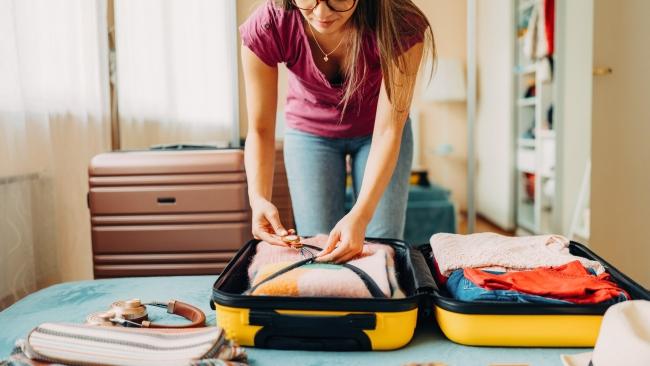 Picking up your wardrobe when you arrive at your destination? This could be a real game-changer. Picture: Getty