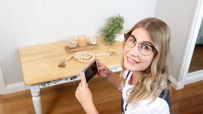 Daniella Busk with some of the items she sells on Facebook Marketplace as part of her business The Chalk House. Picture: Steve Pohlner