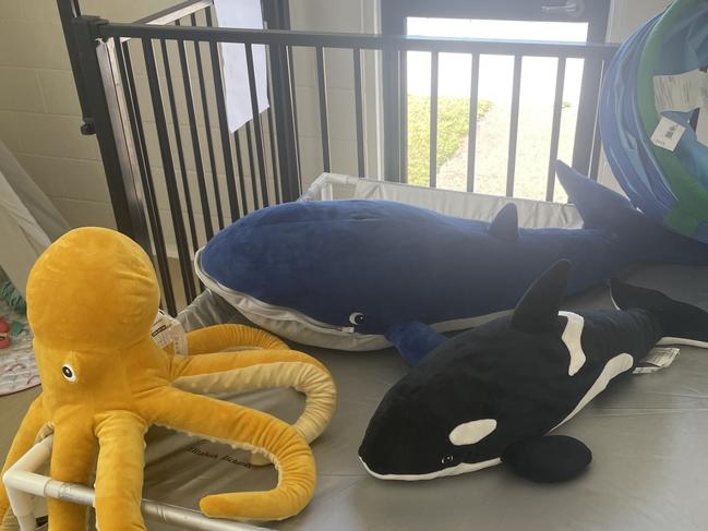 The centre's children's play space has bought into the building's heritage with 2 shark plush toys swimming around.