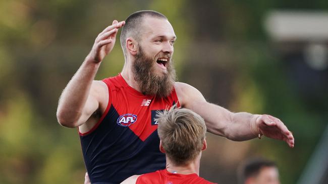 Max Gawn celebrates a goal with Charlie Spargo during Melbourne’s Round 23 clash with North Melbourne.