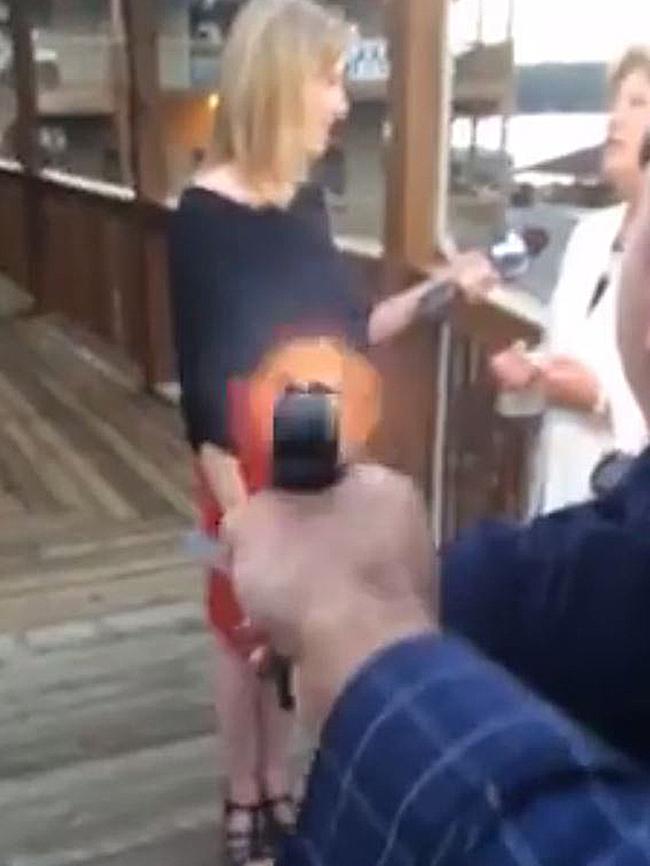 Reporter Alison Parker, left, during an interview on tourism in Bridgewater Plaza in Moneta, Virginia moments before she was shot and killed.