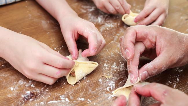 Children leaning how to make Chinese dumplings at Lotus Darling Harbour